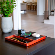 Apple charging station powers iPhone, AirPods, and Apple Watch.