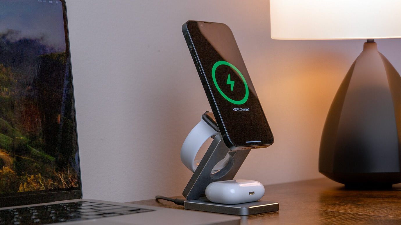 Best magnetic portable charger for iPhone attached and charging the phone.