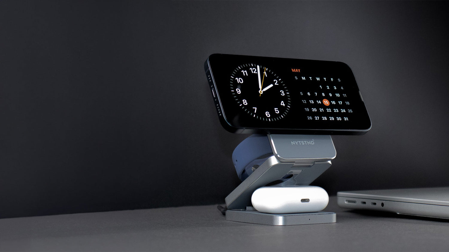 iPhone on MagSafe charging stand.