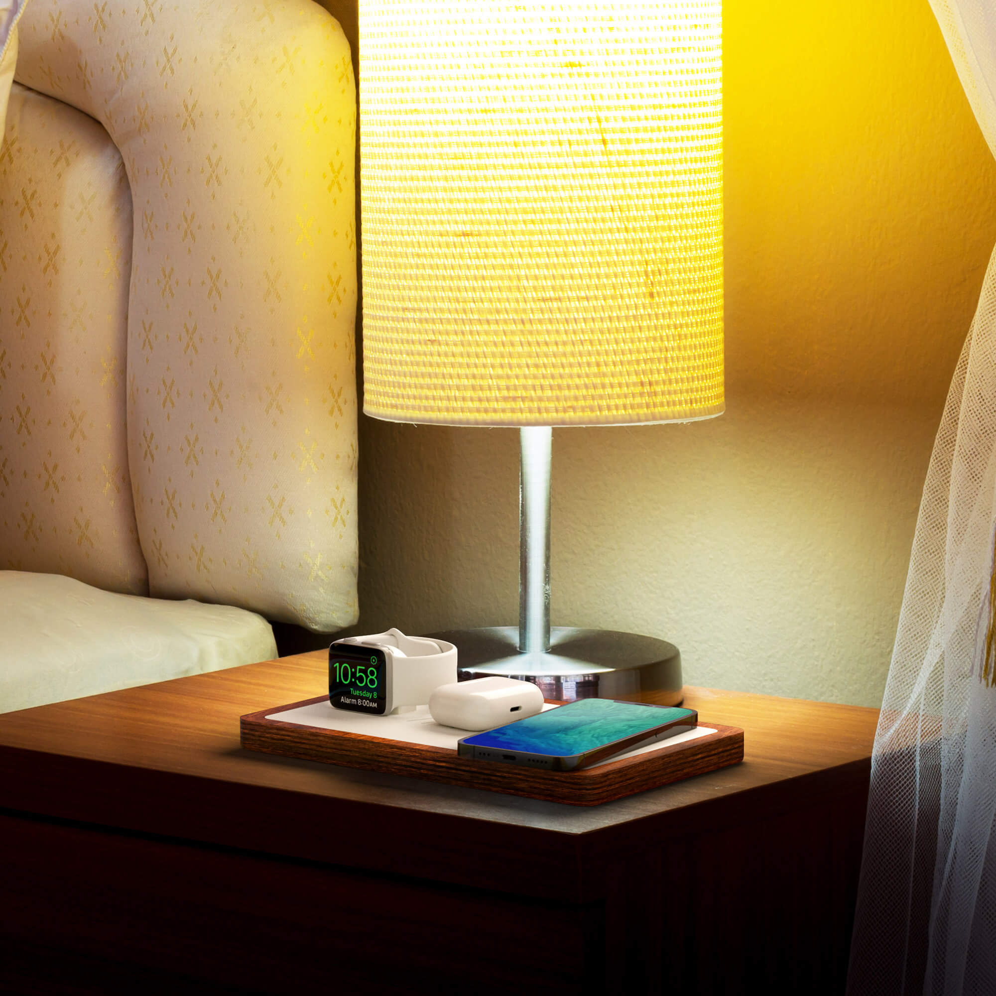 NYTSTND TRIO lifestyle picture on nightstand charging Apple Watch, AirPods, iPhone