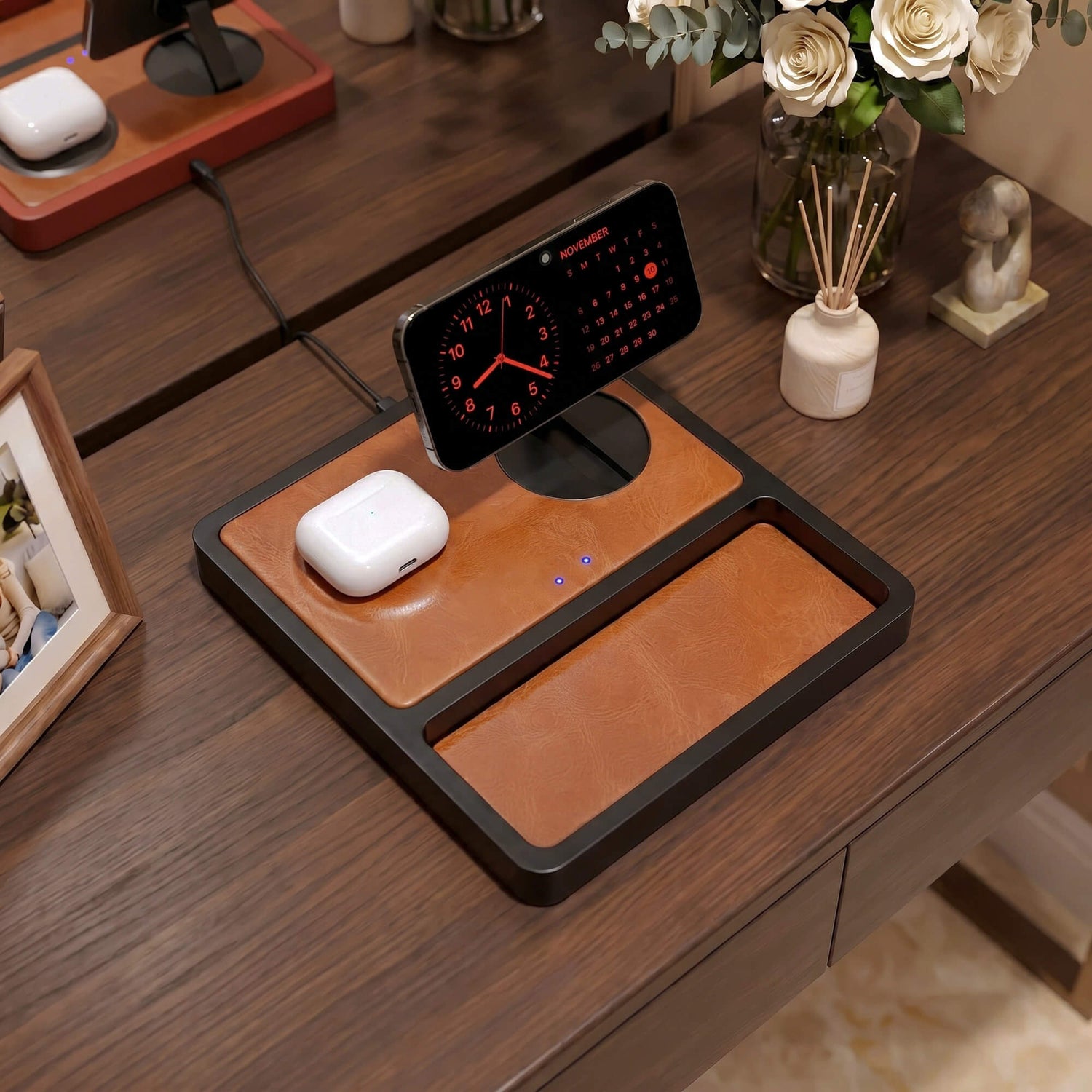 Premium handcrafted solid wood charging station with leather top charging Apple devices on a minimalist desk