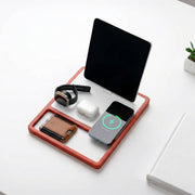 Solid wood charging dock for sale organizing a smartphone, smartwatch, and wallet.