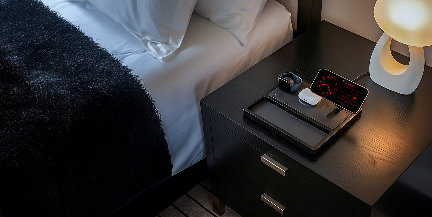 A stylish wood desk organizer with compartments for a phone, pens, and office supplies.