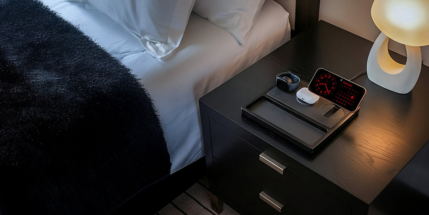 A stylish wood desk organizer with compartments for a phone, pens, and office supplies.