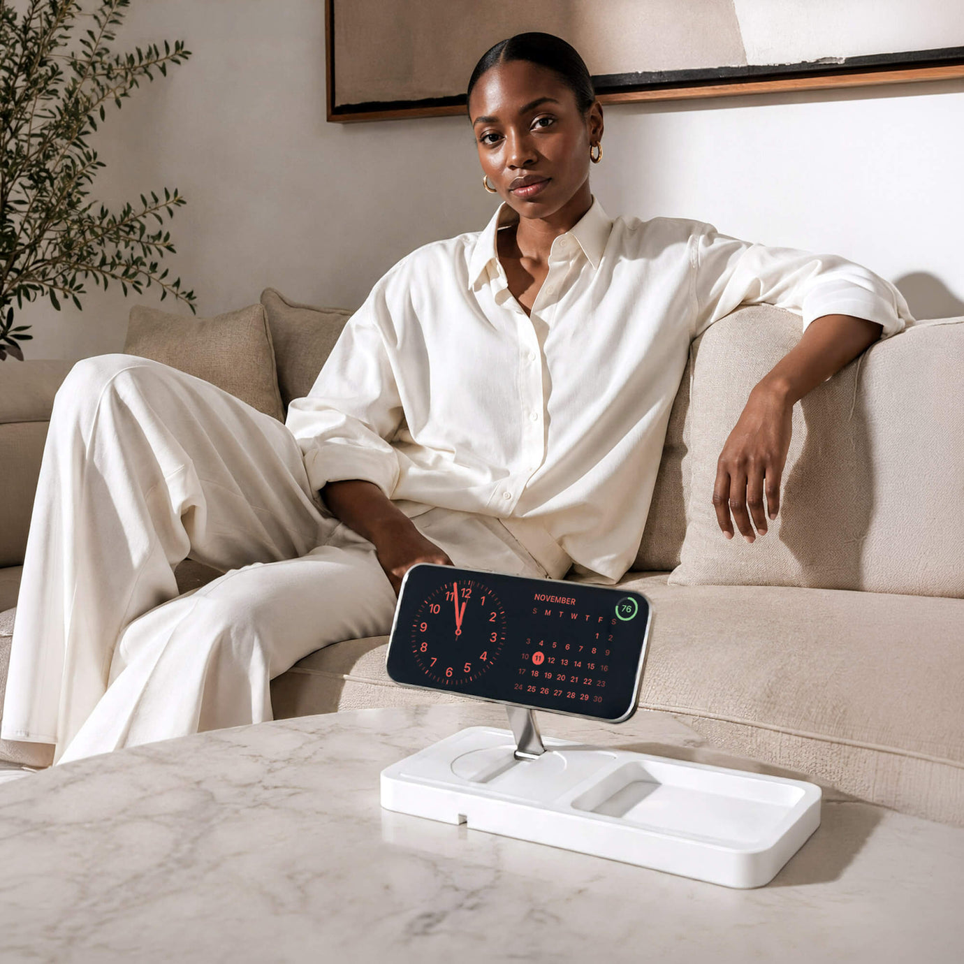 Premium walnut wood charging station on a modern desk with iPhone and Apple Watch, warm natural light, organized minimalist workspace