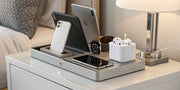 Multi-device charging station powers phone, tablet, smartwatch, and earbuds.