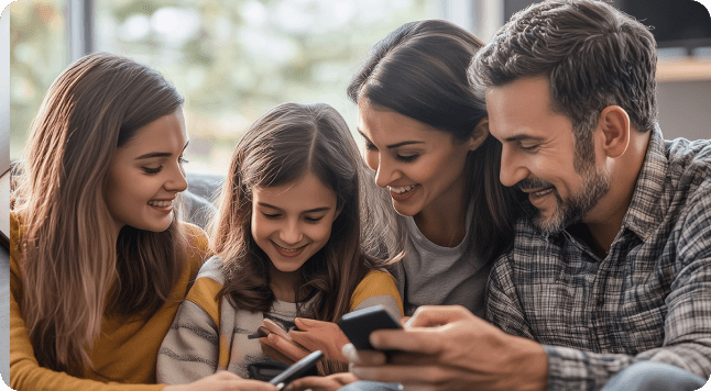 Family charging station for all Apple devices, charging a laptop, phone, and watch.