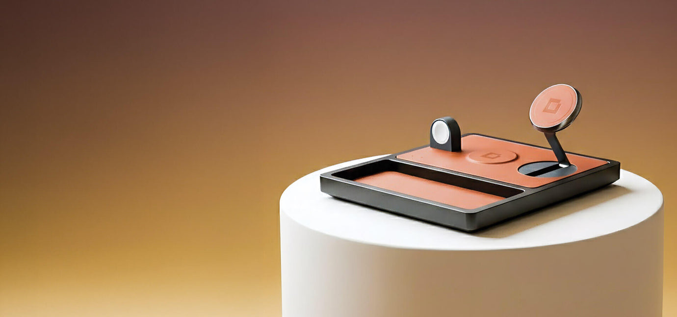 Smartphone charging on a premium leather pad, a stylish alternative to plastic chargers.