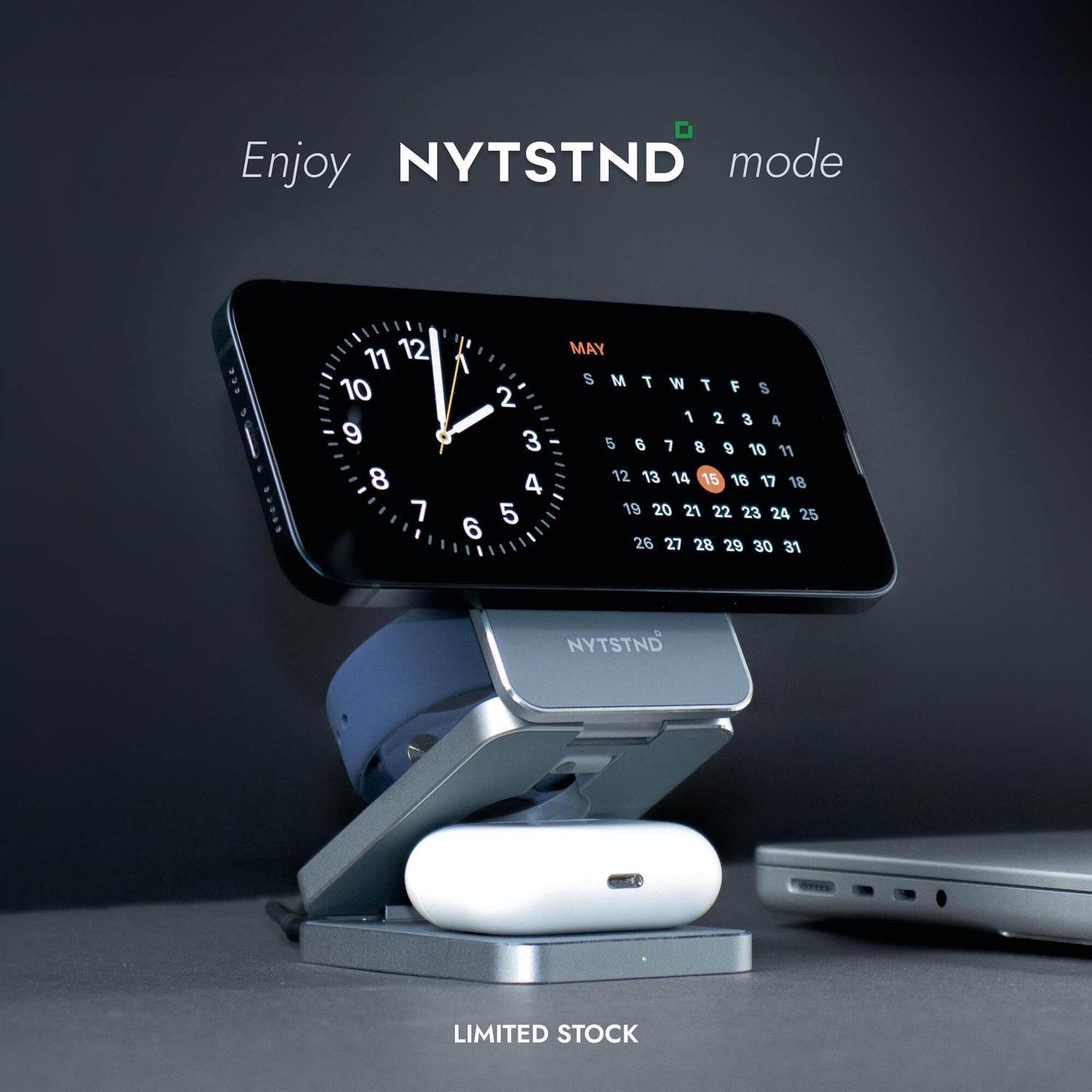 A 2-in-1 MagSafe charger stand simultaneously charging an iPhone and AirPods.