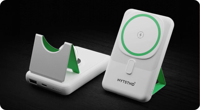 An iPhone 12 Pro Max charging with a magnetic wireless power bank.