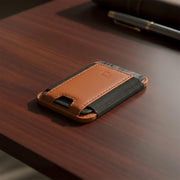 A collection of premium real leather MagSafe wallets in various brown tones.