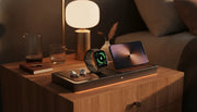 Premium Apple Watch charging station on a wood nightstand with warm ambient lighting