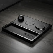 Premium wood wireless charging station on a modern desk with iPhone and leather wallet