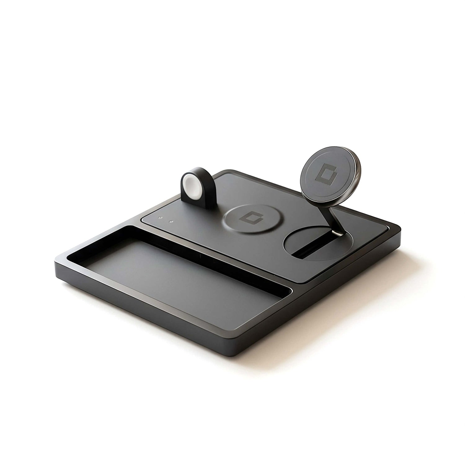 A 3 in 1 charging station for a phone, watch, and earbuds on a clean, organized desk.