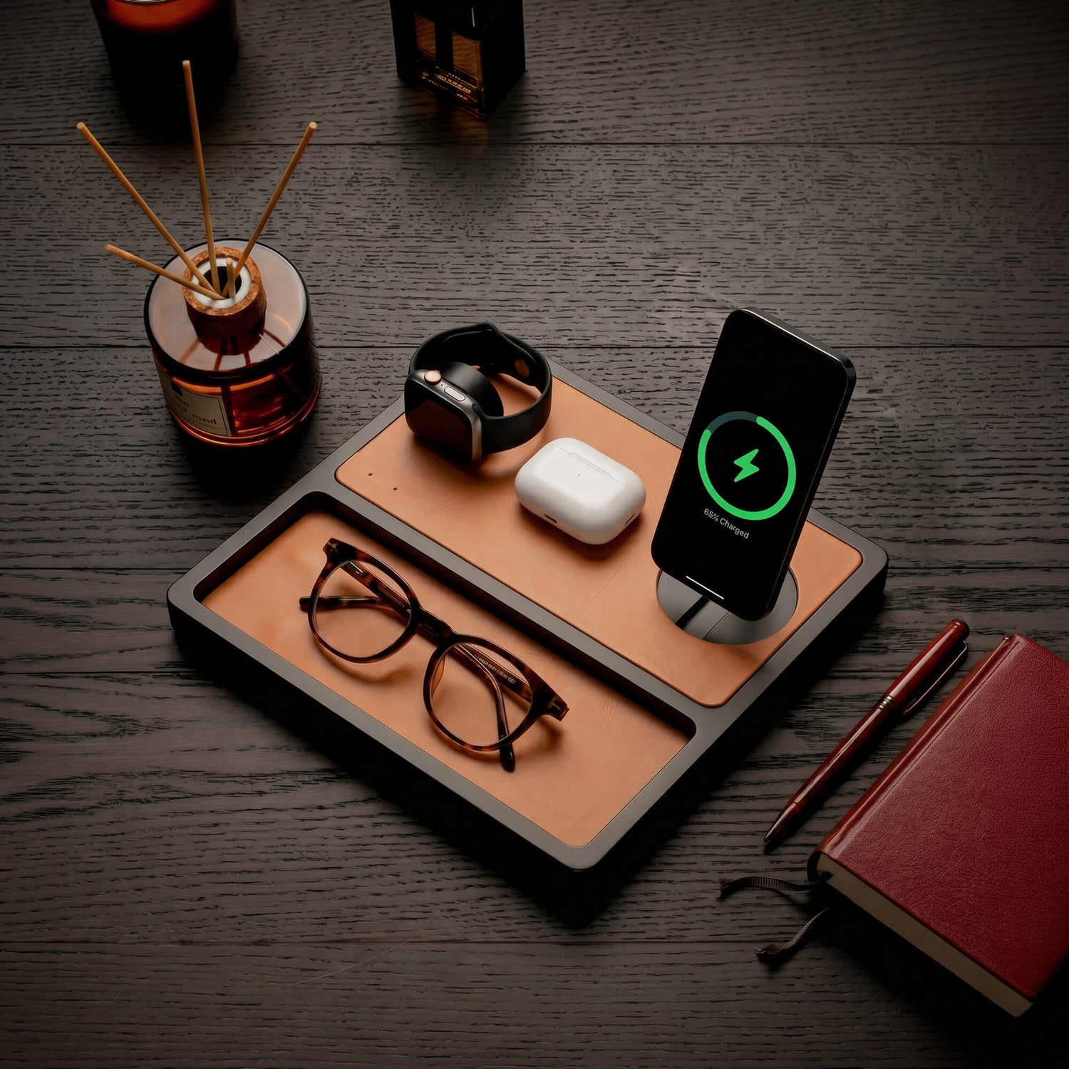 Premium home office desk with a wood wireless charging station featuring an iPhone, Apple Watch, and AirPods on a clean modern desk
