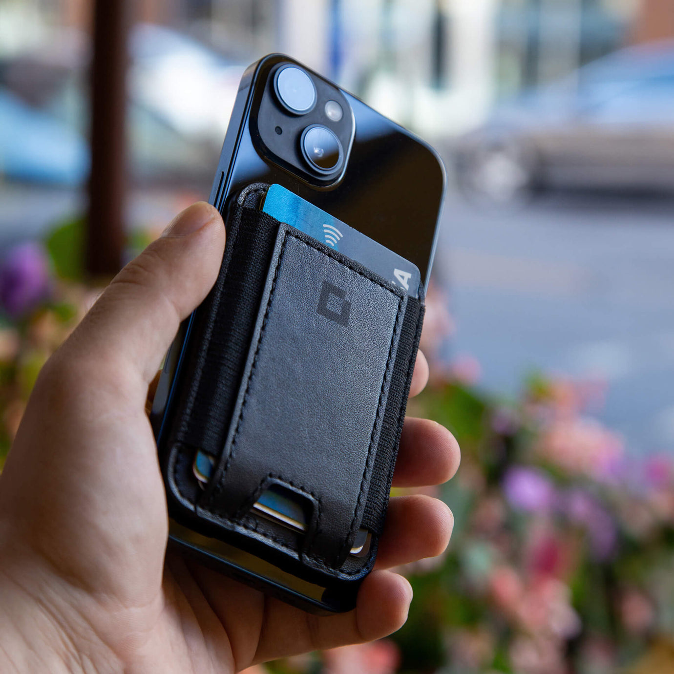 A collection of magnetic wallets for iPhone in various colors and styles.