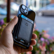 A collection of magnetic wallets for iPhone in various colors and styles.