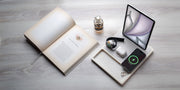 Multi-device charging station powers phone, tablet, smartwatch, and earbuds.
