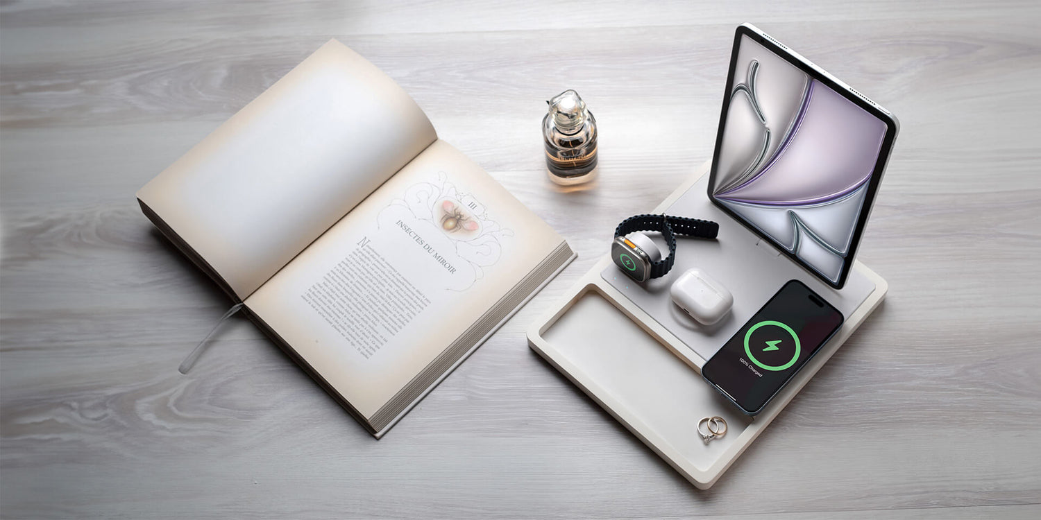 Multi-device charging station powers phone, tablet, smartwatch, and earbuds.