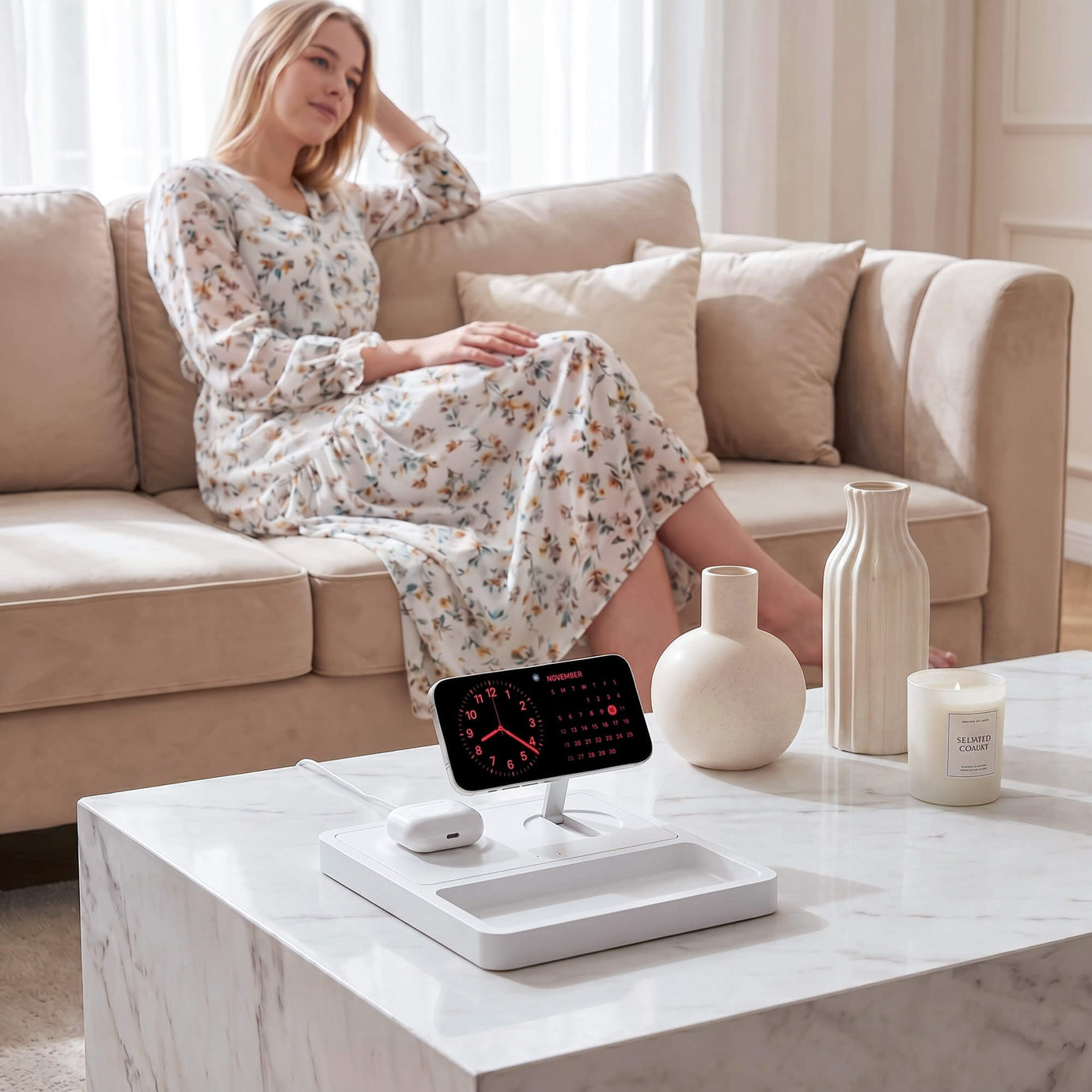 NYTSTND DUO TRAY - Qi2 Magnetic Wireless Charging Dock White — angled lifestyle shot shown on a marble coffee table