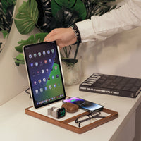 NYTSTND White top oak  wood base, angle view with devices, real picture, on the table next to the book