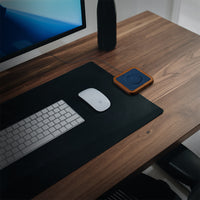 UNO Alcantara Blue - Single-Coil MagSafe Oak Wireless Charger on  the table